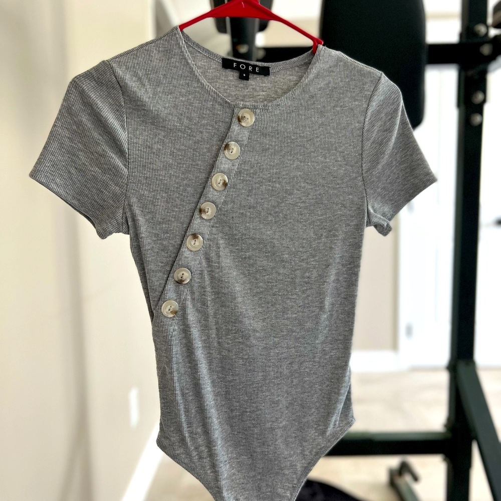 NanaMacs Size Small! Never worn Gray body suit! Excellent condition.